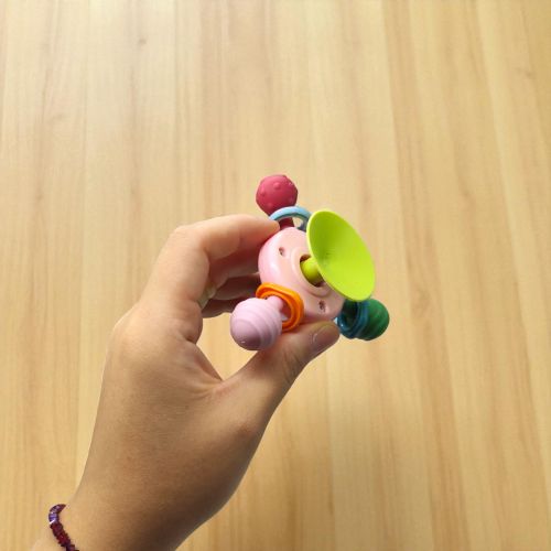 Брязкальце-спінер "Динозаврик Рожевий"; гумові прорізувачі, присоска, в коробці