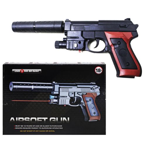 Пістолет з кульками у коробці